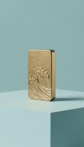 Brass keychain with engraved wave motif